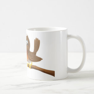 Mug Robin mignon se reposant sur une branche d'arbre