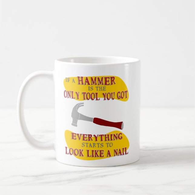 Mug Si le marteau n'est que l'outil Tout ressemble à u (Gauche)