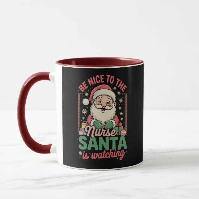 Mug Soyez gentil avec l'infirmière Santa regarde Noël (Gauche)