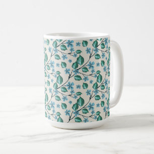 Mug Sprigs aux feuilles verts et fleurs bleues.