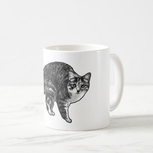 Mug Tabby sous l'éclat de la lumière de neige