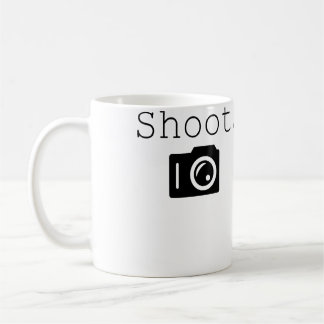 Mug Tirer. Photographiephotographe avec appareil photo