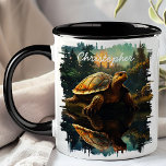 Mug Tortue dans la réflexion forestière<br><div class="desc">Sirotez votre boisson préférée avec la Tortue dans la Mug de réflexion forestière. Cette charmante tasse présente une image détaillée d'une tortue reposant au bord d'un lac forestier tranquille, avec le paysage serein magnifiquement reflété dans l'eau. Customisé de votre nom, il ajoute une touche personnelle et unique. Parfait pour le...</div>