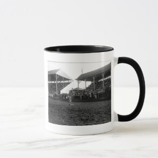 Mug Tours Roping à un rodéo