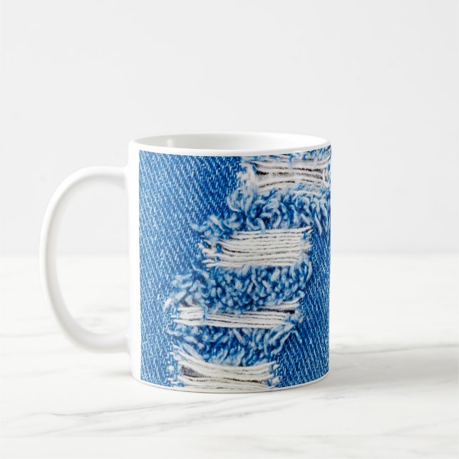 Mug Trou sur Denim Jeans. Torn Blue je déchiré (Gauche)