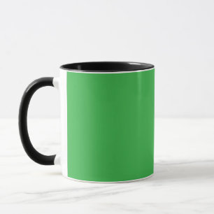 Mug un arrière - plan vert avec une bordure blanche