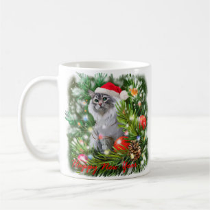 Mug Un chat dans un casquette du Père Noël et un sapin