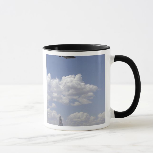 Mug Un CV-22 Osprey survole un Hercules C-130 (Droite)