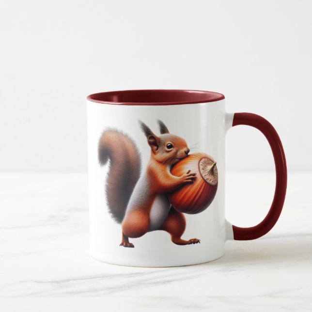 Mug Un écureuil roux serre contre lui une noisette. (Droite)