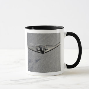 Mug Un Esprit B-2 survole l'océan Pacifique