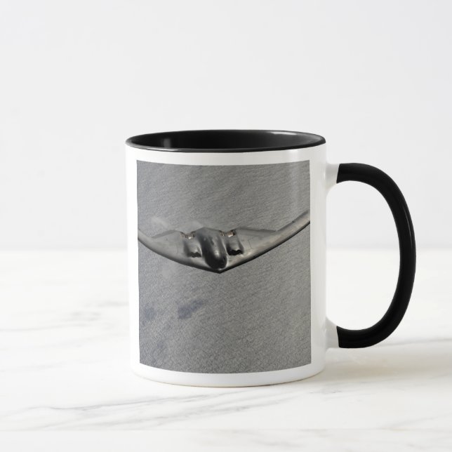 Mug Un Esprit B-2 survole l'océan Pacifique (Droite)