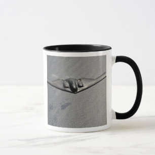 Mug Un esprit B-2 vole au-dessus de l'océan pacifique