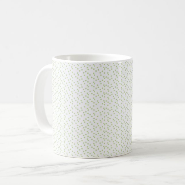 Mug Une dispersion de carrés vert pâle sur blanc. (Devant gauche)