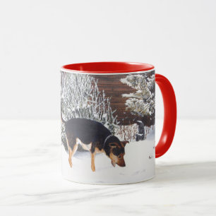 Mug Winter snow scene with cute black and tan dog