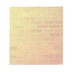 Mur de brique en Jotter du Bloc-notes orange et ja