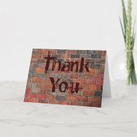 mur en brique Merci