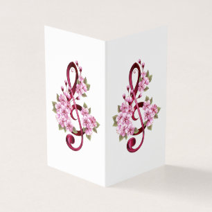 Musical treble clef notes with sakura flowers
