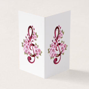 Musical treble clef notes with sakura flowers