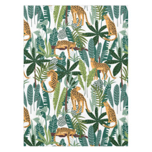 Nappe Brown leopard in the tropical lush jungle leaves