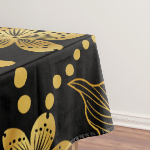 Nappe feuilles tropicaux & fleurs motif en or sur noir