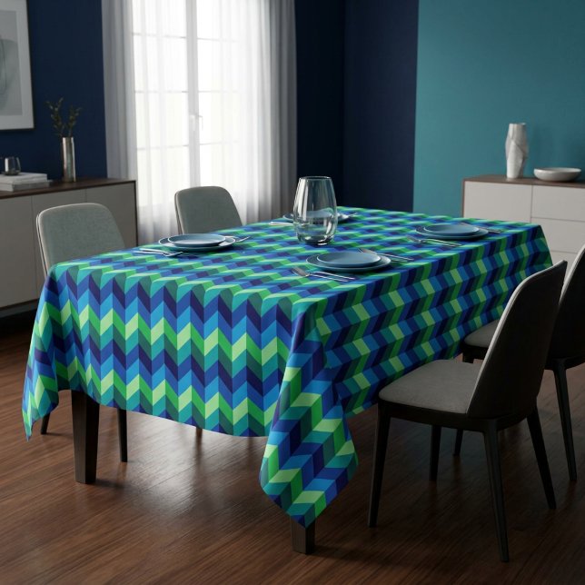 Nappe moyenne chevrons dégradés bleu-vert (Blue Green Ombre Chevrons Medium Tablecloth covering a table in a modern style dining room.)