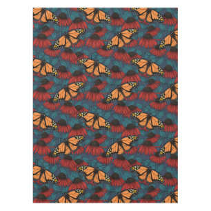 Nappe Papillon monarque sur des fleurs rouges