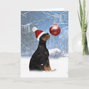 Noël de chiot de rottweiler - carte de vacances