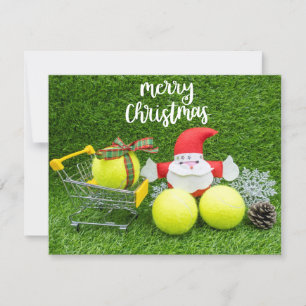 Noël de tennis avec le Père Noël et balle de tenni