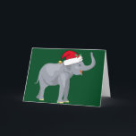 Noël Eléphant mignon à Santa Hat Carte de vacances<br><div class="desc">Les mignons animaux de vacances sont ma partie préférée de Noël. Un bel éléphant gris portant un chapeau de Père Noël rouge et ayant l'air heureux sur un arrière - plan vert festif. Ça me remplit d'esprit de Noël.</div>