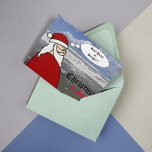 Noël en Juillet Père Noël Surf Carte de voeux plié<br><div class="desc">Noël en juillet ! Père Noël a la décision de faire,  surf ou traîneau. Célébrez cet été avec un design Père Noël original de Skylar Jenkins. Photo originale de la plage à Oceanside,  CA.</div>