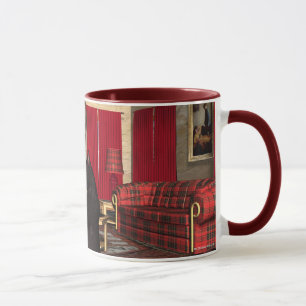 Noël jouant des tasses de Kitty de chat noir