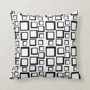 Noir sur le coussin blanc d'années '60 de