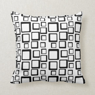 Noir sur le coussin blanc d'années '60 de