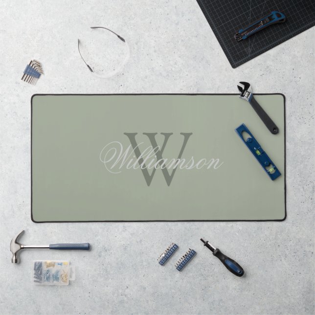 Nom de famille gris sur monogramme vert sur fond v (Poste de travail)