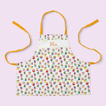 Nom personnalisé et tablier à gâteau pour enfants<br><div class="desc">Joli tablier de cupcake pour les enfants. Décoré d'une jolie motif colorée en cupcakes. Personnalisé avec un nom personnalisé que vous pouvez customiser avec votre propre nom ou texte court. Grand cadeau pour un enfant qui aime faire cuire ou manger des cupcakes et d'autres sucreries et desserts.</div>