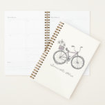 Nom personnalisé Whimsical Bicycle Cute Vintage<br><div class="desc">Séjournez organisé en style avec ce joli planificateur avec une illustration fantaisiste d'un mignon vélo en lavande douce et gris, avec un panier de fleurs. Personnalisez-le avec votre nom pour en faire le vôtre ! Parfait pour suivre vos plans ou donner à quelqu'un de spécial, ce planificateur ajoute une touche...</div>