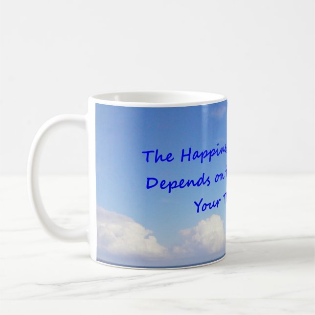 Nuages dans le ciel bleu imprimés sur une tasse de (Gauche)