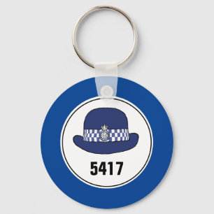 Numéro de badge. Femme policier WPC. Porte-clés