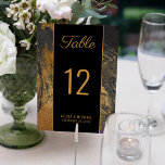 Numéro De Table Abstrait moderne peinture écriture or mariage fonc<br><div class="desc">Elégante carte de table mariage de peinture acrylique sophistiquée en gris foncé, parties scintillant d'or jaune, et palette de couleur noire avec touches abstraites et faux or moderne script de typographie contemporaine entièrement modifiable. La carte est adaptée à toutes les saisons des réceptions de mariage à la mode urbaine et...</div>
