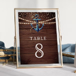 Numéro De Table Ancre bleue Rustic Wood Marine Mariage nautique<br><div class="desc">Elégante carte de numéro de table à thème nautique avec ancre aquarelle peinte et lumières à cordes avec typographie moderne.</div>