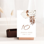 Numéro De Table Boho Terracotta Pampas Brown Mariage Floral Grass<br><div class="desc">Voici notre Boho Terracotta Brown Pampas Grass Floral Mariage Numéro de table, un mélange captivant de charme bohème et d'élégance rustique. Admirez l'allure fantaisiste de l'herbe de pampas et des orchidées blanches délicates, sur fond de blanc et de marron en terre cuite, pour une célébration d'inspiration botanique qui saisit l'essence...</div>