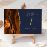 Numéro De Table Brûlé Orange Gold Agate Marine Mariage bleu<br><div class="desc">Le bord gauche de cette élégante carte de numéro de table mariage moderne comporte une bordure d'aquarelle orange brûlée,  recouverte d'une parties scintillant en faux or. Le texte personnalisable combine écriture manuscrite couleur or,  et polices italique et cuivre sur un arrière - plan bleu marine foncé.</div>