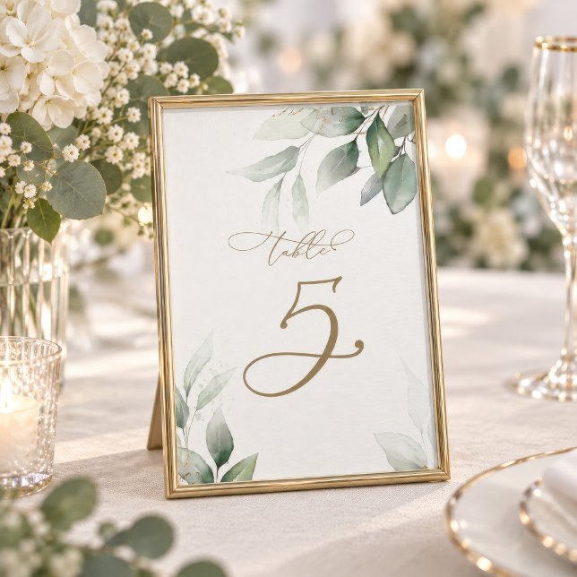Numéro de table de mariage Eucalyptus Greenery Tab (Eucalyptus Greenery Table Number card displayed in a gold frame with florals)