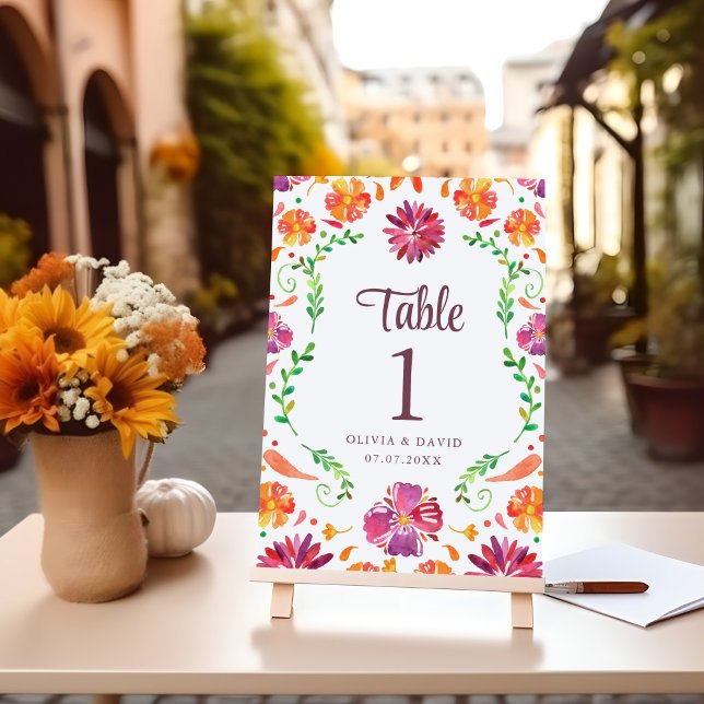 Numéro de table de mariage Floral Fiesta mexicain  (White Mexican Floral Fiesta Wedding Table Number on a table with flowers.)