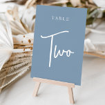 Numéro De Table Dusty Blue Main Scripté Table DEUX<br><div class="desc">Des cartes numériques simples et chic en bleu et blanc poussiéreux font une déclaration élégante à votre mariage ou événement. Le design comporte "table [nombre]" dans un mélange de sérigraphie classique et de lettres manuscrites. Le design se répète de part et d'autre. Cartes numérotées individuellement vendues séparément; commandez chaque numéro...</div>