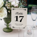 Numéro De Table Elégant cadre noir blanc Noms et Mariage Date<br><div class="desc">Cartes de table élégantes en noir et blanc avec polices en gras et un cadre orné en haut et en bas. Cartes de numéro de table en noir et blanc personnalisées avec vos noms et date de mariage dans un élégant design noir et blanc.</div>