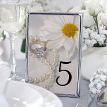 Numéro De Table Elegant White Daisy Wedding Table Numbers<br><div class="desc">These pretty Elegant White Daisy Wedding Table Numbers add a touch of class to the tables at your marriage reception,  bridal shower or engagement party. These custom flowery table number cards feature a floral photograph of a white daisy flower blossom,  princess cut diamond engagement ring and white pearl necklace.</div>