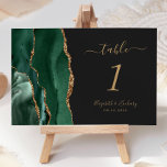Numéro De Table Emerald Green Gold Agate Mariage foncé<br><div class="desc">Le bord gauche de cette élégante carte de numéro de table mariage moderne comporte une bordure en aquarelle vert émeraude,  ornée d'une parties scintillant en faux or. Le texte personnalisable combine écriture manuscrite couleur or,  italique et polices de cuivre sur un arrière - plan non noir.</div>