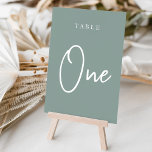 Numéro De Table Eucalyptus vert à la main Scripté Table ONE<br><div class="desc">Des cartes numériques simples et chic dans Eucalyptus Green et white font une déclaration élégante à votre mariage ou événement. Le design comporte "table [nombre]" dans un mélange de sérigraphie classique et de lettres manuscrites. Le design se répète de part et d'autre. Cartes numérotées individuellement vendues séparément; commandez chaque numéro...</div>
