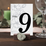 Numéro De Table Floral Line Art Wedding Table Number Card<br><div class="desc">Elegant and modern wedding table number card featuring delicate floral line art on a soft neutral background. The minimalist botanical illustration adds a romantic and refined touch to your reception décor, while the bold table number ensures guests can easily find their seats. Perfect for garden weddings, modern minimalist celebrations, botanical...</div>